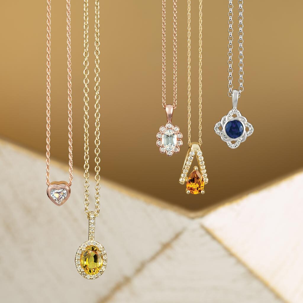 Gemstone and accented diamond pendants